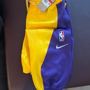 Nike menTwo-Tone Yellow and Purple Shorts
